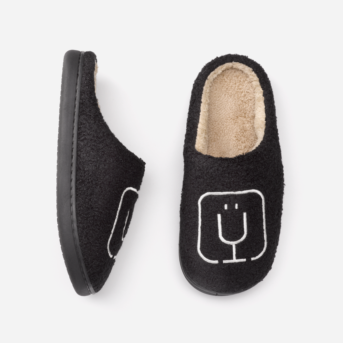 brumate-fuzzy-slippers-black-s1 apparel-slippers-above.png